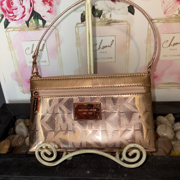 Michael Kors Handbags - Michael Kors Metallic Rose Wristlet